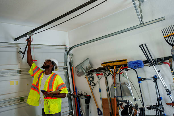 Professional Garage Door Panel Replacement technician working in Clear Lake, IA